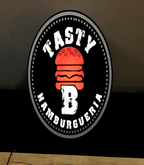 letreiro luminoso de uma hamburgueria